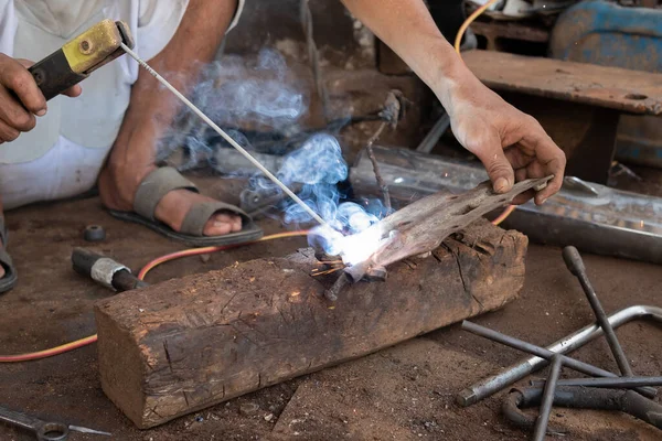 stock image Welders work on welding metal. Men working in welding workshop