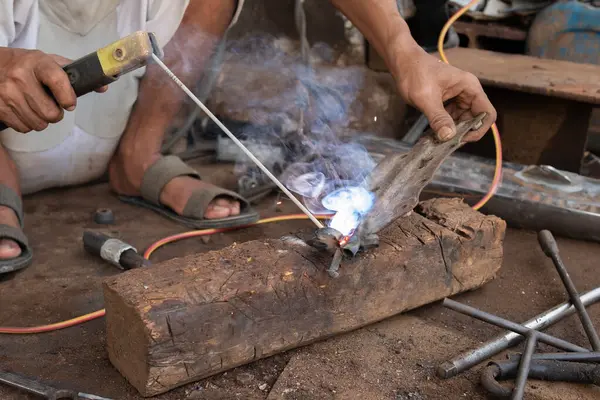 stock image Welders work on welding metal. Men working in welding workshop