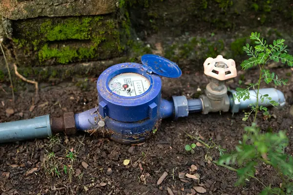 家庭用水の使用量を規制するための水道メーター ストックフォト