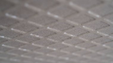 Arkaplan olarak kullanışlı bej madde dokusunun yakın plan ayrıntıları