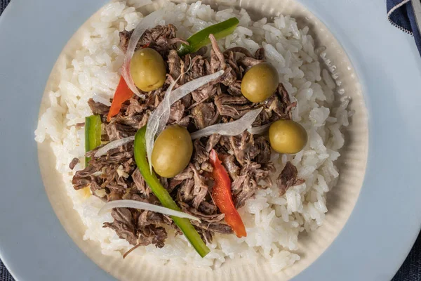 Top view of Shredded meat with rice, typical Cuban food.