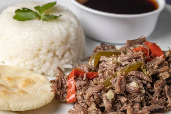 Close up of Shredded meat with rice, typical Cuban food.