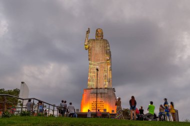 San Miguel de Tucuman, Argentina - January 18th, 2024: Light and sound show on the Blessing Christ on San Javier Hill in Tucuman Argentina. clipart