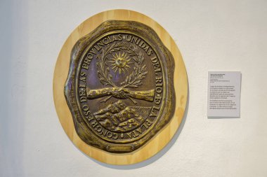 San Miguel de Tucuman, Argentina - January 18th, 2024: Bronze plate with the reproduction of the seal of the Congress of Tucuman in 1816. clipart