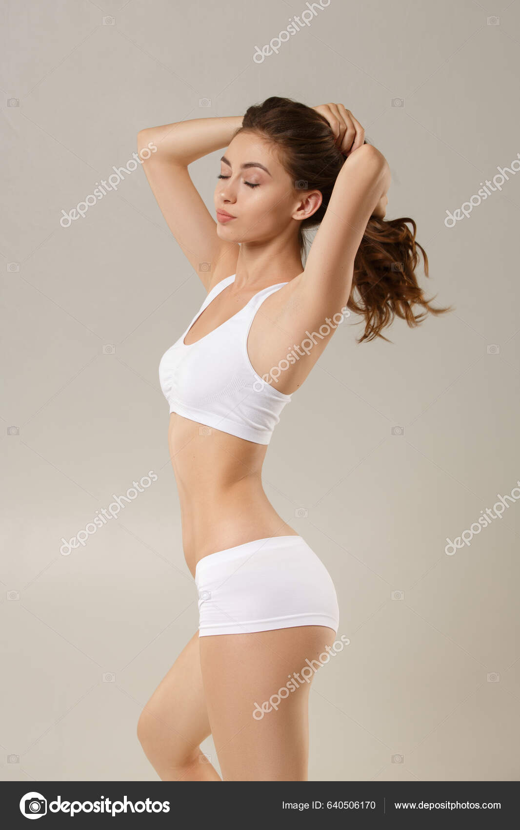 Feeling Beautiful Woman Natural Slim Tanned Body Underwear Plays Hair Stock  Photo by ©panin.sergey.me.com 640506170