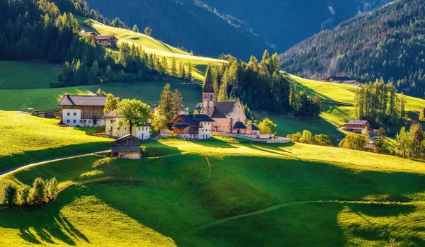 stock image Church of Santa Maddalena (Santa Magdalena) in beautiful morning light. A beautiful view of the mountain scenery in the Dolomites with the famous mountain village of Santa Maddalena. Val di Funes, South Tyrol,  Italy.