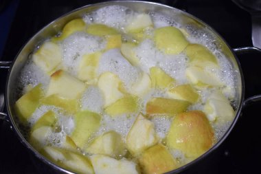 cooking process of apples in the kitchen