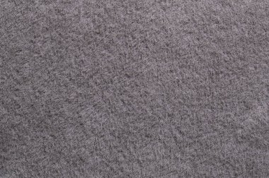 Yumuşak lifli kabarık gri tüylü kumaş.