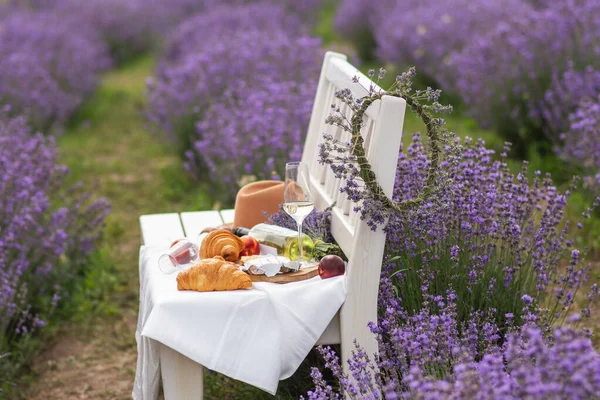 Summer Picnic Lavender Field Croissants Peaches Salami Cheese Bottle Wine Royalty Free Stock Photos