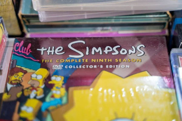 stock image DVD disc of complete ninth season of The Simpsons at the flea market. Ankara, Turkey - May 7, 2023.