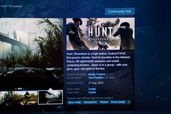 stock image Hunt: Showdown PC game poster on Steam game store application laptop screen. Hunt: Showdown is a first-person shooter video game. Ankara, Turkey - May 23, 2023.