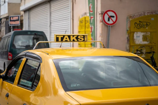 stock image Yellow taxi sign on the street in Turkey.