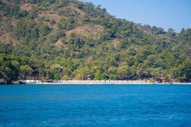 Samanlık Sahili, Akdeniz, Fethiye Körfezi. Mugla, Türkiye - 10 Temmuz 2023.