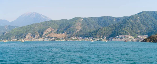 stock image Panoramic view of Fethiye harbor from Fethiye Bay. Mugla, Turkey - July 10, 2023.
