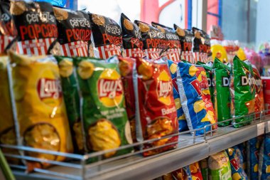 Potato chips on the shelves at the supermarket. Ankara, Turkey - July 20, 2023.