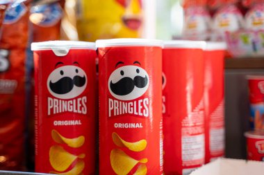 Red original Pringles potato chips on the shelf in the supermarket. Ankara, Turkey - July 20, 2023.