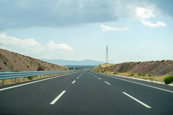 Empty toll highway. Otoyol 33 or North Aegean Motorway (Kuzey Ege Otoyolu) and abbreviated as the O-33 is a 55.2 km long toll motorway in western Turkey.