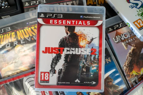 stock image Just Cause 2 PlayStation game CD at the flea market. Ankara, Turkey - August 6, 2023.