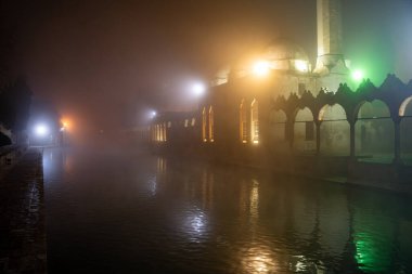 Balikligol in Sanliurfa in foggy weather at night. clipart