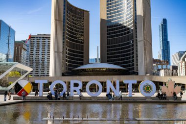 View of Nathan Phillips. Nathan Phillips Square is an urban plaza in Toronto, Ontario, Canada. Toronto, Canada - April 30, 2024. clipart