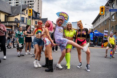 Young people at the Pride Weekend Festival on Church Street. Toronto, Canada - Jun 29, 2024. clipart