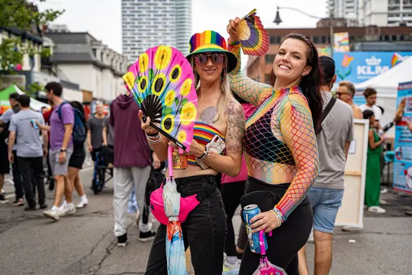 stock image The couple at the Pride Weekend Festival on Church Street. Toronto, Canada - Jun 29, 2024.