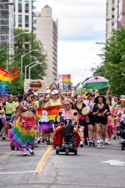 Participants at the 2024 Annual Pride Parade in Downtown Toronto. Toronto, Canada - Jun 30, 2024. clipart