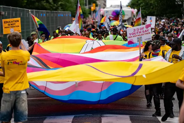 stock image The rainbow flag at the 2024 Annual Pride Parade in Downtown Toronto. Toronto, Canada - Jun 30, 2024.