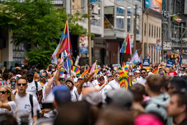 stock image Crowds of people at the 2024 Annual Pride Parade in Downtown Toronto. Toronto, Canada - Jun 30, 2024.