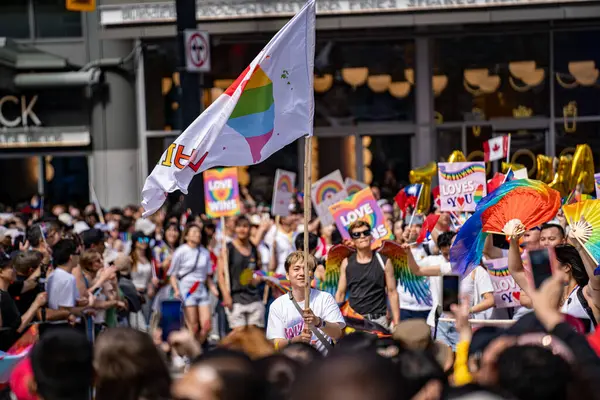 stock image Crowds of people at the 2024 Annual Pride Parade in Downtown Toronto. Toronto, Canada - Jun 30, 2024.