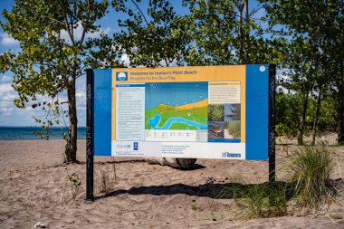 Hanlan's Point Beach sign in the Toronto Islands. Toronto, Canada - August 22, 2024. clipart