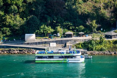 Tour boat in Niagara Falls from the Canadian side. Niagara Falls, Canada - September 20, 2024. clipart