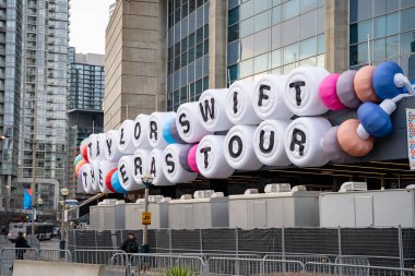 Swiftie friendship bracelet sign in front of Rogers Centre for Taylor Swift The Eras Tour Concert. Toronto, Canada - November 21, 2024. clipart