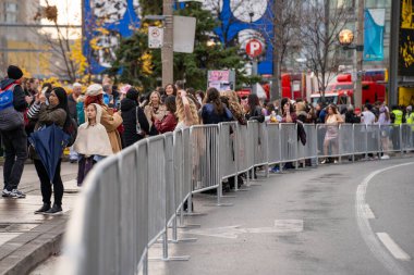 Swifties before Taylor Swift The Eras Tour Concert in Toronto. Toronto, Canada - November 21, 2024. clipart