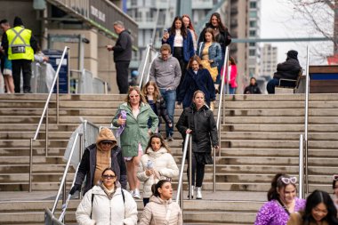 Crowd of people in front of Rogers Centre before Taylor Swift The Eras Tour Concert. Toronto, Canada - November 21, 2024. clipart