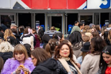 Crowd of people in front of Rogers Centre before Taylor Swift The Eras Tour Concert. Toronto, Canada - November 21, 2024. clipart