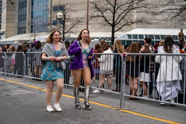 Taylor Swift fans Swifties gathered at Rogers Centre before the The Eras Tour Concert. Toronto, Canada - November 21, 2024. clipart