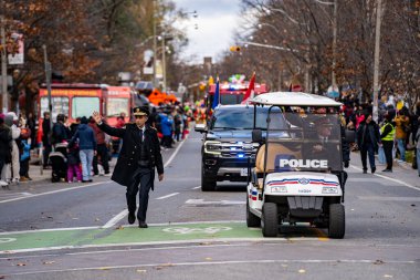 Toronto Paramedic Services Chief Bikram Chawla at the Toronto Santa Claus Parade. Toronto, Canada - November 24, 2024. clipart