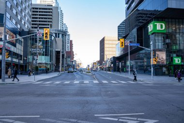 The intersection of Yonge Street and Eglinton Avenue West in the heart of Midtown Toronto. Toronto, Canada - December 04, 2024. clipart