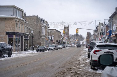 Winter view of the streets of the town of Fergus, Ontario. Fergus, Canada - January 2, 2025. clipart