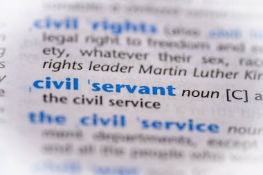 Sözlükte devlet memuru kelimesi var. Seçici odak, kapat.