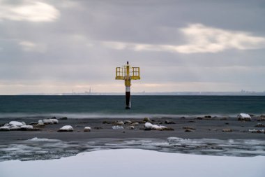 Snow-covered beach in winter. clipart