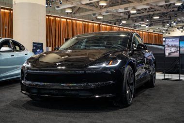 Tesla Model 3 otomobil 2025 Kanada Uluslararası Otomobil Fuarı 'nda. Toronto, Kanada - 18 Şubat 2025.