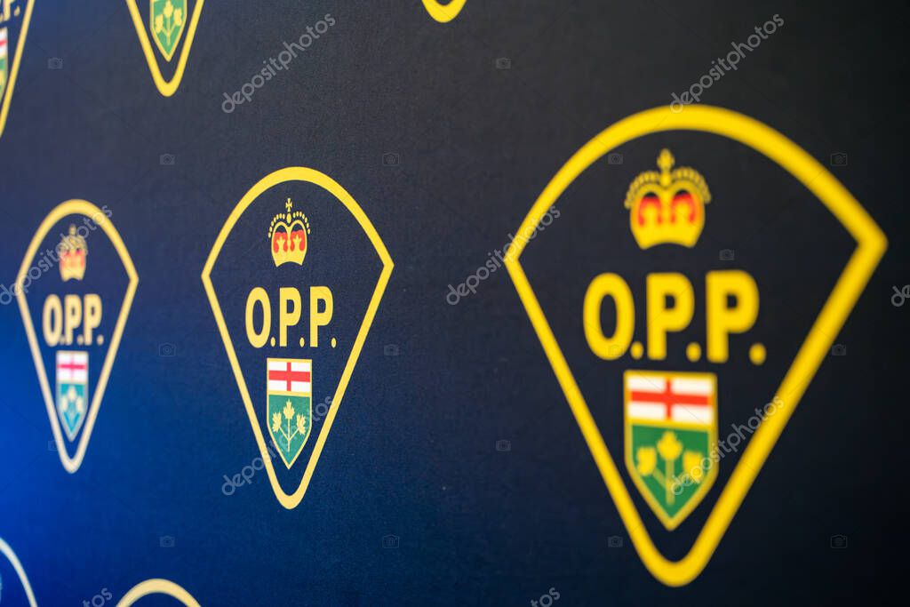 Ontario Provincial Police logo display. Toronto, Canada - February 19, 2025.