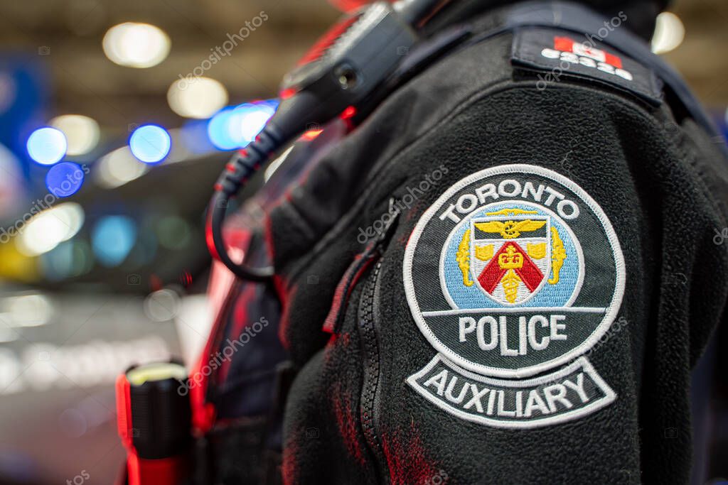 Toronto Police logo on uniform. Toronto, Canada - February 19, 2025.