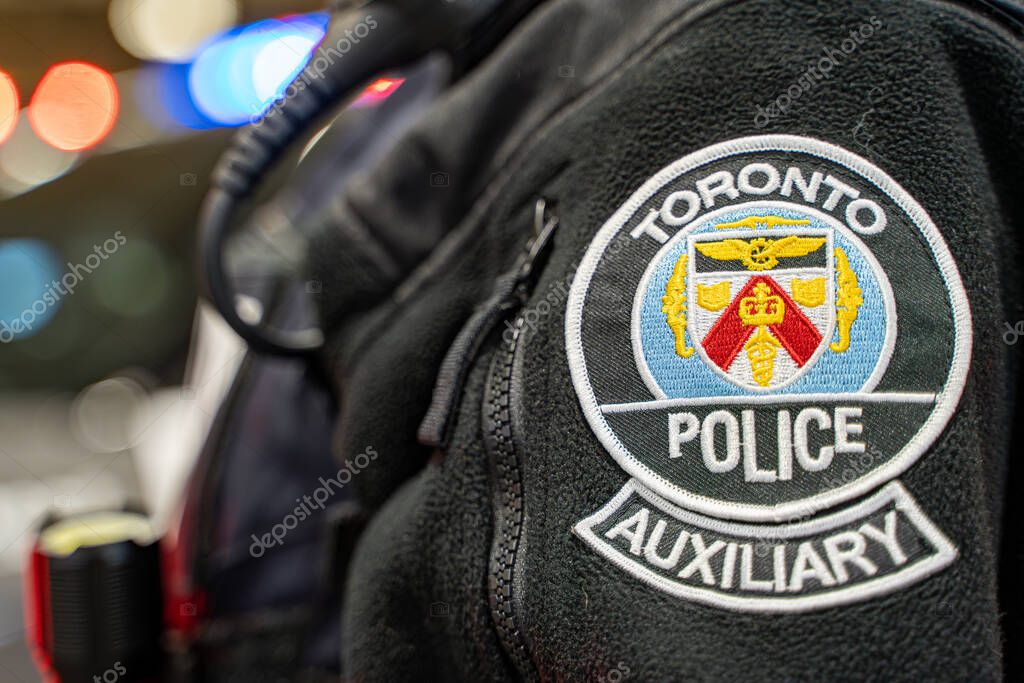Toronto Police logo on uniform. Toronto, Canada - February 19, 2025.