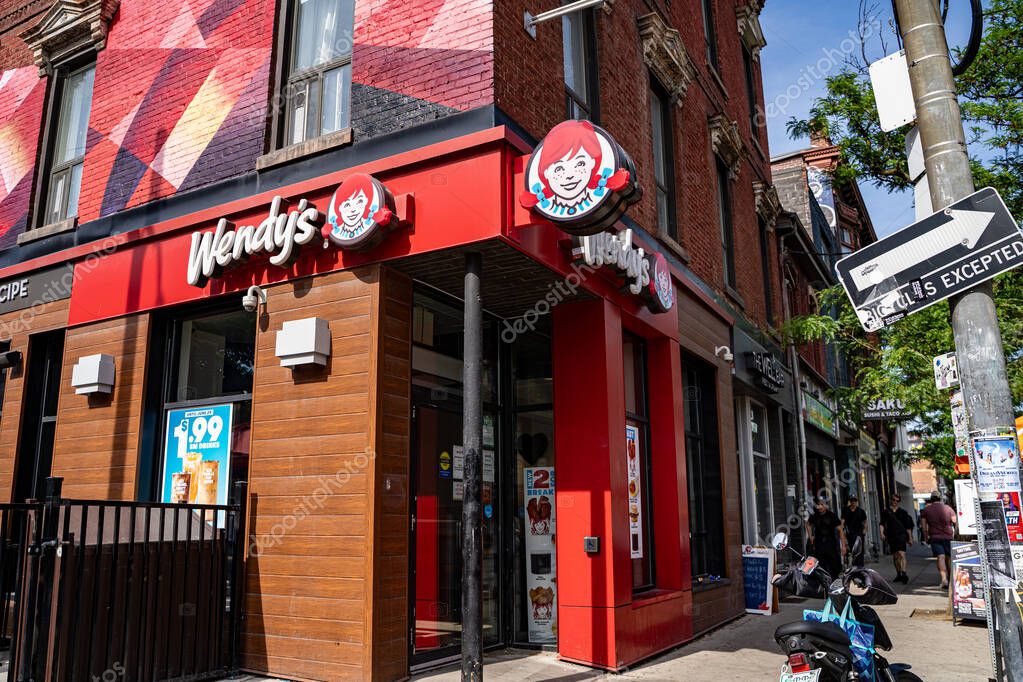 Exterior view of Wendy's restaurant in Toronto. Toronto, Canada - June 15, 2025.