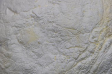 The Smooth and Tangy Texture of Cow's Cheese: A Close-Up View.