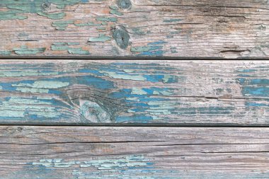 Kırık mavi boya desenli eski ahşap zemin, yakın çekim manzaralı..