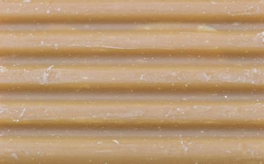 Yatay Sırtlar ve İnce Noktalarla desenli Bej Yüzey.